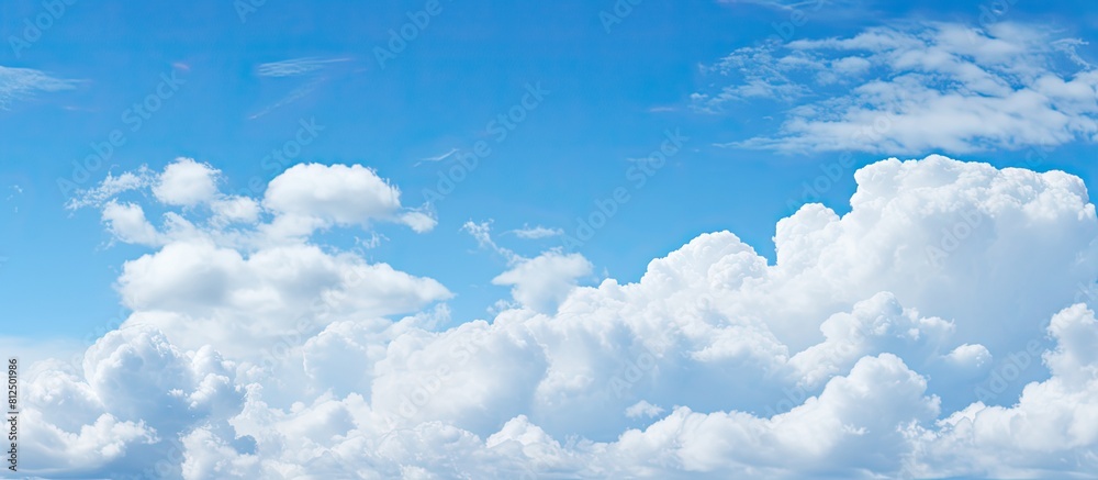 Leinwandbilder blue sky with a mesmerizing pattern of white cloudscape providing ample copy space for images