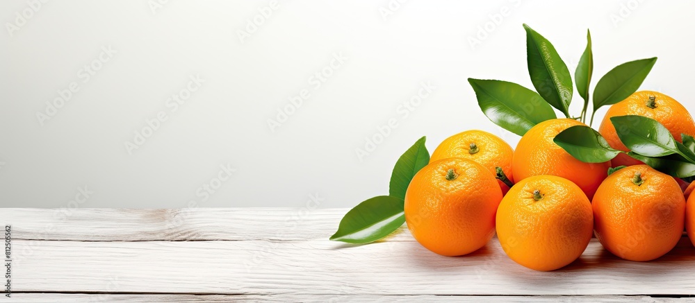 Aufkleber seasonal fruits such as vibrant tangerines or clementines abundantly adorned with leaves showcased o