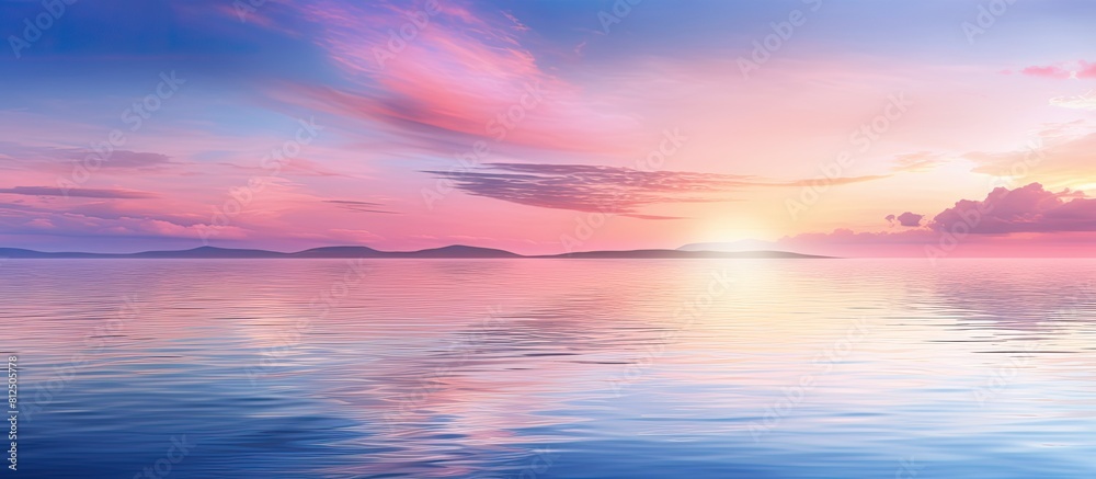 Aufkleber a serene blue and pink sunset reflecting on the tranquil water creating a captivating copy space ima