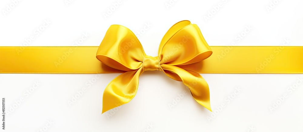Poster a bright yellow gift bow stands out against the clean white background creating a visually striking 