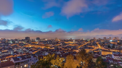 Panorama showing aerial view of downtown of Lisbon day to night transition timelapse, Portugal.