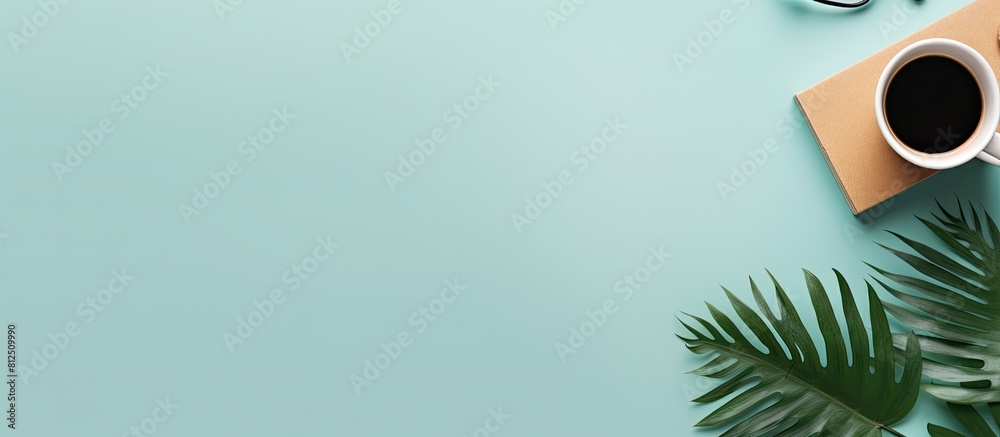 Fototapete Top view of a color background with a minimal workspace including a keyboard smartphone and coffee cup Ample copy space for personalization Flat lay style shot
