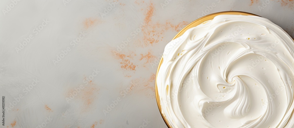 Poster Top view of a cake with creamy frosting set against a food background Perfect for menu concepts with copy space for text