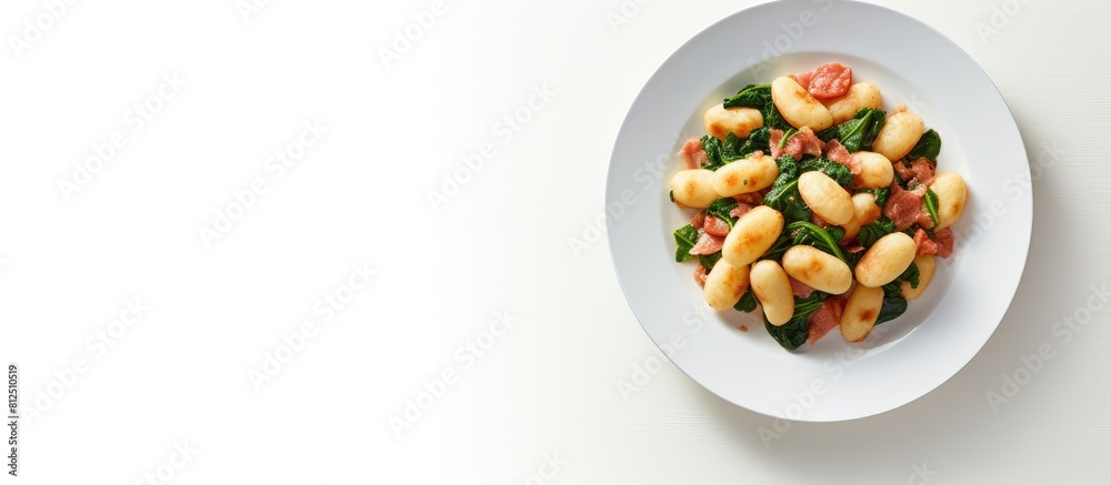 Poster A top view image of a plate featuring cooked Gnocchi potato pasta with spinach and parma ham placed on a white background with empty space for text or other elements. Creative banner. Copyspace image