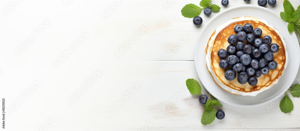 Aufkleber Top view of a copy space image featuring light background with cottage cheese pancakes sour cream and blueberries Suitable for breakfast or lunch