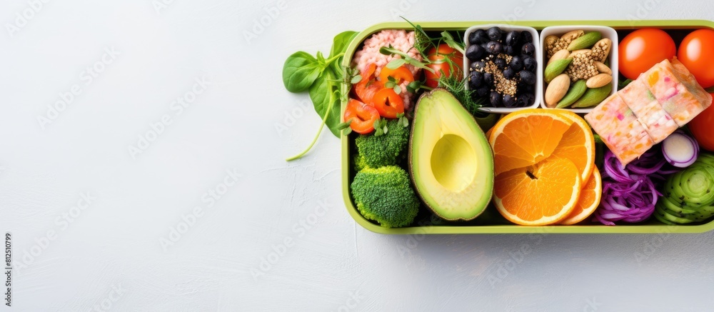 Poster top view of a nutritious vegan lunch box emphasizing the clean diet eating concept the image showcas
