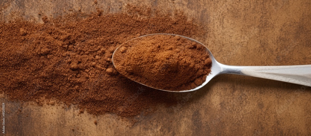 Poster A top view of a spoon with coffee powder creating a visually appealing copy space image
