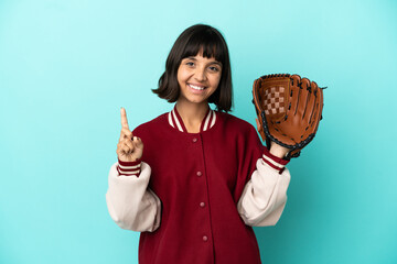 Young mixed race player woman with baseball glove isolated on blue background showing and lifting a...