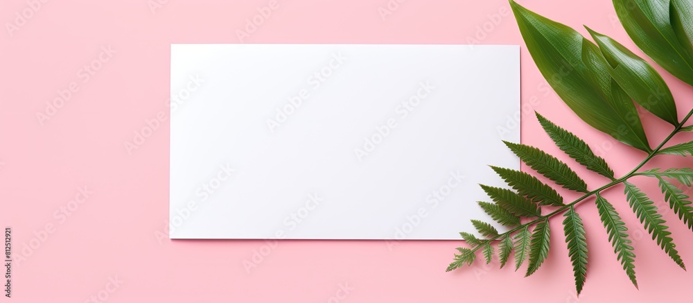 Fototapete top view of a trendy and minimal creative concept with a paper blank on a pastel pink background the