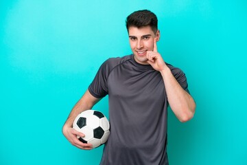 Young caucasian football player man isolated on blue background thinking an idea while looking up