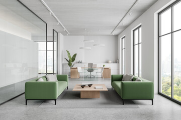Cozy office interior with ceo desk and chill zone near panoramic window