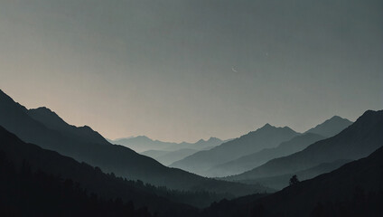 Fototapeta premium A black and white photo of a mountain range in the distance with clouds above.