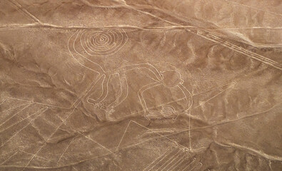 Stunning aerial view of monkey geoglyph, mysterious Nazca line in peruvian desert 