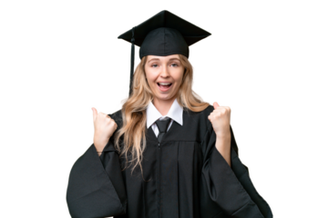 Young university English graduate woman over isolated background celebrating a victory in winner position