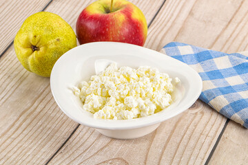 Organic cottage cheese in the bowl