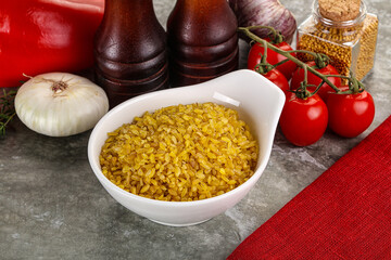 Dry wheat bulgur cereal heap