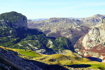 View from the top of Sedlena Greda in Durmitor National Park: a fragment of Boljska Greda and the mountains next to it. Autumn colors in the mountains of Montenegro.