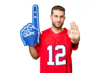 sports fan man over isolated chroma key background making stop gesture