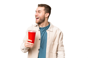 Young handsome blonde man holding soda over isolated chroma key background laughing in lateral position