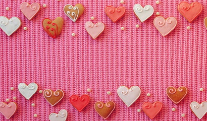 Valentine's Day Wallpaper. Heart-shaped Cookies on pink Fabric. Romance Conception. Love Symbol. Web Banner Design