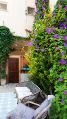 Cozy Garden Nook With Purple Flowering Vine Vertical Composition Bright Colors