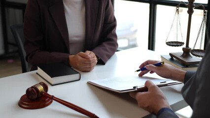 Lawyers provide legal advice and chat with clients via online tablets to clarify and give advice on the rules in contract documents that must be followed at the company correctly and fairly.