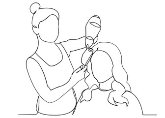 the hairdresser does the styling of the girl