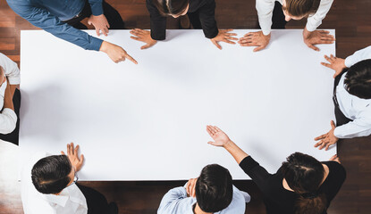 Panorama banner top view of office worker and businesspeople on meeting table pointing to empty...