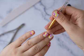 Manicured tools Stylish colorful summer female nails. Modern trendy stylish Beautiful manicure....