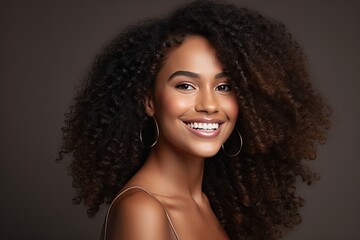 Beautiful black woman smiling and having in studio shot.