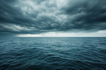 Obraz premium A valley, obscured by low-lying clouds, is bathed in sunlight as it fades over mountain silhouettes at dusk. Beautiful simple AI generated image in 4K, unique.