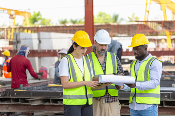 Engineer and foreman worker team checking project at precast factory site, Engineer and builders in...