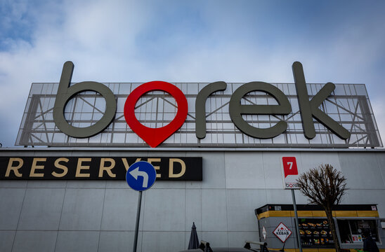 Wroclaw, Poland - February 9, 2023:&nbsp; Borek shopping center with Reserved shop logotype on the wall.
Car park in front of the building. 