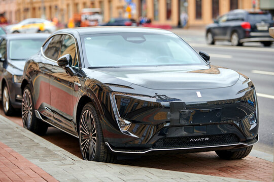 Minsk, Belarus. Apr 13, 2024. Black Avatr 11 parked on city street along roadside. EV car produced by Chinese electric automotive company Avatr Technology,  premium EV brand Changan Automobile
