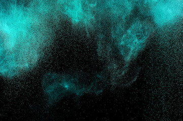 Grunge green texture. Aquamarine smoke cloud on black background. Light blue textured on dark sky. Space backdrop. Explosion pattern.	