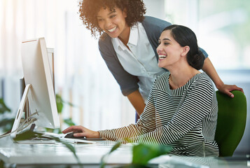 Business women, laughing and teamwork on computer for public relations, planning and project...