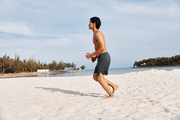 Muscular Asian Man Enjoying a Tropical Beach Vacation - Abs of Paradise
