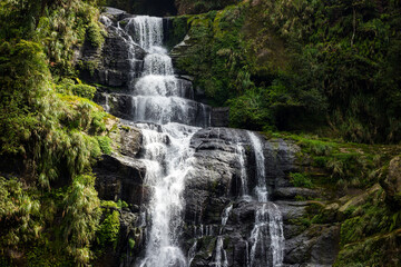 Obraz premium Waterfall located on Sun Link Sea mountain in Taiwan