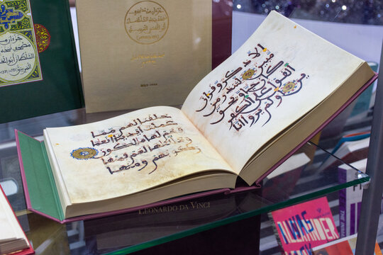 A copy of the Holy Quran in the handwriting of Abu al Hasan Ali ibn Othman at the Abu Dhabi International Book Fair 2024. UAE.