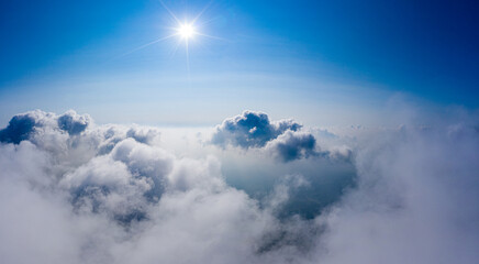 Sky Panoramic View Above Clouds with Bright Sun and Blue Sky