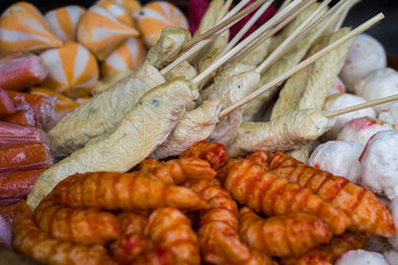 A mixture of various kinds of dimsum is being steamed 