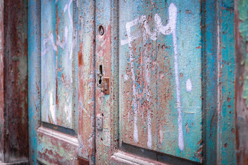 Paint texture of a blue wooden door of an abandoned house. Tenerife, Canary Islands, Spain.