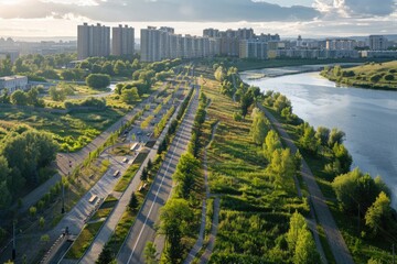 Aerial view of a city with a river in the foreground. Suitable for urban development or travel concepts