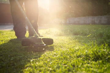 Lawn mover on green grass. Machine for cutting lawns.