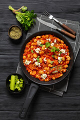 greek giant baked beans with feta on pan