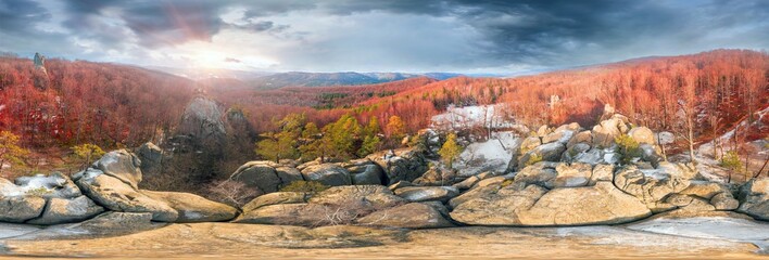 Dovbush rocks in winter in Bubnyshche, Carpathians, Ukraine, Europe. Huge stone giants rise in the...