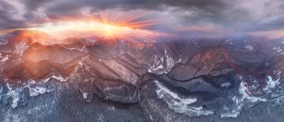 Severe frost at sunrise in the Carpathians, Transcarpathia, Ukraine. A drone flies over the tops of...