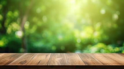 A Wooden table space with green background, blurred back view .