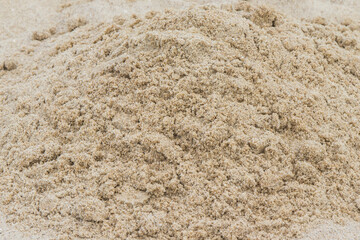Sand on beach used for fun and build various shapes. Vacation time and child development