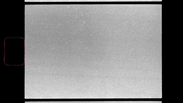 scan of 8mm film border with heavy filmstrip shacking and grain, dusty film scan, film border overlay.